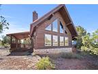 Absolutely beautiful cabin nestled in the trees on 2 acres