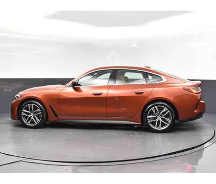 2023 BMW 4 Series 430i Gran Coupe is a Orange 2023 BMW 430 Model i Coupe in Jackson MS