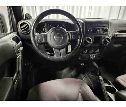 2013 Jeep Wrangler Unlimited Sport is a 2013 Jeep Wrangler Unlimited SUV in Fort Wayne IN