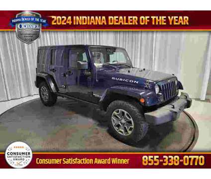 2013 Jeep Wrangler Unlimited Rubicon is a Blue 2013 Jeep Wrangler Unlimited Rubicon SUV in Fort Wayne IN