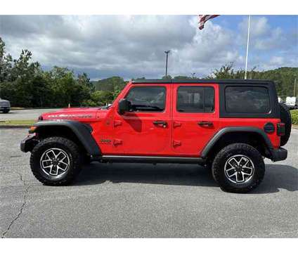 2024 Jeep Wrangler Rubicon is a Red 2024 Jeep Wrangler Rubicon SUV in Canton GA