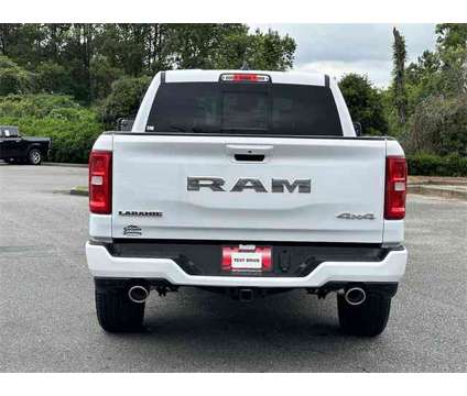 2025 Ram 1500 Laramie is a White 2025 RAM 1500 Model Laramie Truck in Canton GA