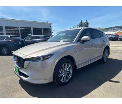 2024 Mazda CX-5 2.5 S Premium Package is a Silver 2024 Mazda CX-5 SUV in Gladstone OR