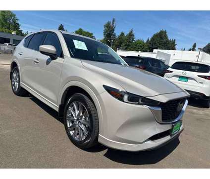 2024 Mazda CX-5 2.5 S Premium Package is a Silver 2024 Mazda CX-5 SUV in Gladstone OR