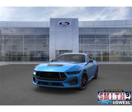 2024 Ford Mustang GT is a Blue 2024 Ford Mustang GT Coupe in Lowell IN