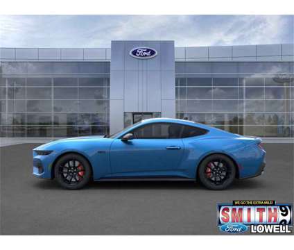 2024 Ford Mustang GT is a Blue 2024 Ford Mustang GT Coupe in Lowell IN