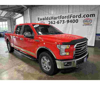2015 Ford F-150 XLT is a Red 2015 Ford F-150 XLT Truck in Milwaukee WI