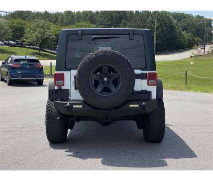 2017 Jeep Wrangler Unlimited Sport 4x4 is a White 2017 Jeep Wrangler Unlimited Sport SUV in Anderson SC