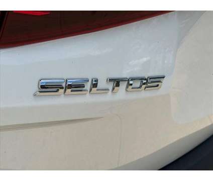 2021 Kia Seltos S is a Black, White 2021 SUV in Peoria IL