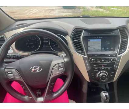 2017 Hyundai Santa Fe Limited Ultimate is a Red 2017 Hyundai Santa Fe Limited SUV in Tuscumbia AL
