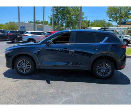 2020 Mazda CX-5 Touring is a Blue 2020 Mazda CX-5 Touring SUV in Daytona Beach FL