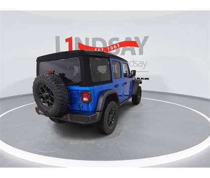 2024 Jeep Wrangler Willys 4xe is a Blue 2024 Jeep Wrangler SUV in Manassas VA