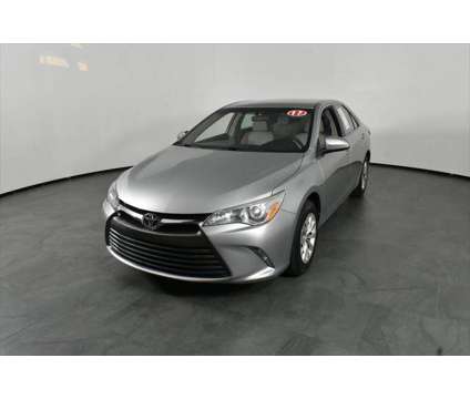 2017 Toyota Camry LE is a Silver 2017 Toyota Camry LE Sedan in Orlando FL