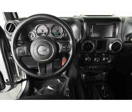 2015 Jeep Wrangler Sport is a Silver 2015 Jeep Wrangler Sport SUV in Orlando FL