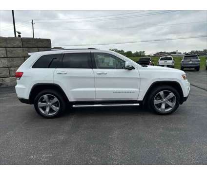 2014 Jeep Grand Cherokee Limited is a White 2014 Jeep grand cherokee Limited SUV in Dubuque IA