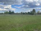 Gladwin, Level unimproved corner lot for camping or building