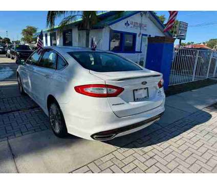 2015 Ford Fusion for sale is a White 2015 Ford Fusion Car for Sale in Orlando FL