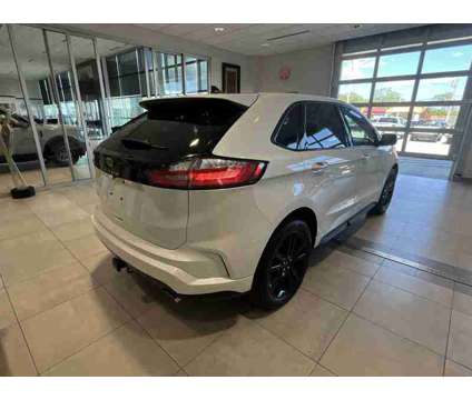 2021UsedFordUsedEdge is a White 2021 Ford Edge Car for Sale in Milwaukee WI