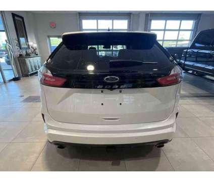 2021UsedFordUsedEdge is a White 2021 Ford Edge Car for Sale in Milwaukee WI