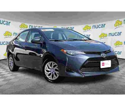 2018UsedToyotaUsedCorolla is a Grey 2018 Toyota Corolla Car for Sale in Norwood MA