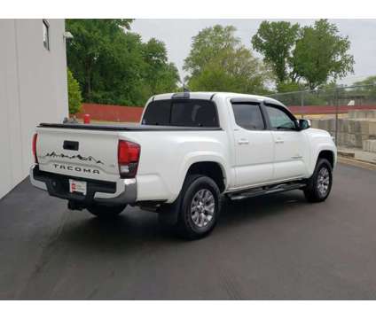 2019 Toyota Tacoma SR5 is a White 2019 Toyota Tacoma SR5 Car for Sale in Waukegan IL