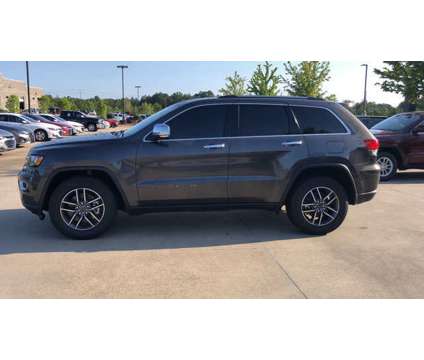 2021 Jeep Grand Cherokee Limited is a Grey 2021 Jeep grand cherokee Limited Car for Sale in Hattiesburg MS