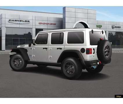 2024 Jeep Wrangler 4xe Willys is a White 2024 Jeep Wrangler Car for Sale in Horsham PA