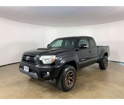 2014 Toyota Tacoma TRD Sport is a Black 2014 Toyota Tacoma TRD Sport Car for Sale in Peoria IL