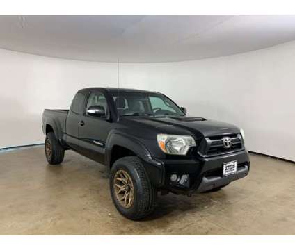 2014 Toyota Tacoma TRD Sport is a Black 2014 Toyota Tacoma TRD Sport Car for Sale in Peoria IL