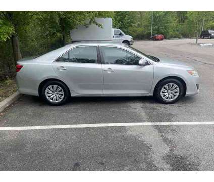 2013 Toyota Camry LE is a Silver 2013 Toyota Camry LE Car for Sale in Warwick RI