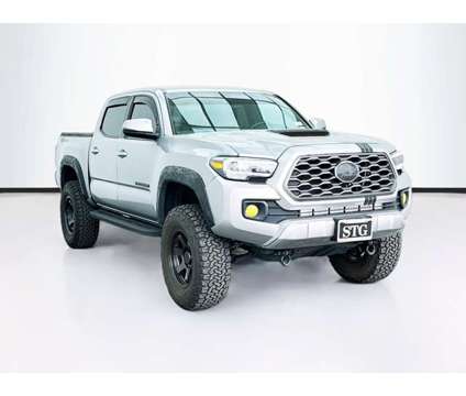 2021 Toyota Tacoma 2WD TRD Sport V6 is a Silver 2021 Toyota Tacoma TRD Sport Truck in Bellflower CA
