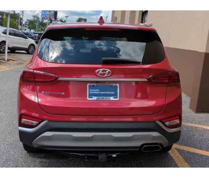 2019 Hyundai Santa Fe SEL is a Red 2019 Hyundai Santa Fe SUV in Ocala FL