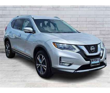 2018 Nissan Rogue SL is a Silver 2018 Nissan Rogue SL Station Wagon in Longmont CO