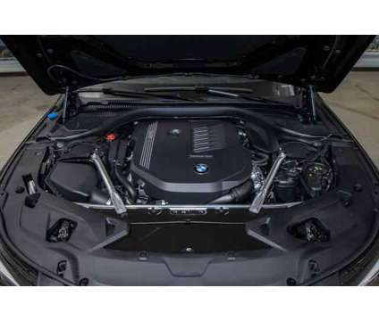 2025 BMW 8 Series i xDrive Convertible is a Black 2025 BMW 8-Series Convertible in Lake Bluff IL