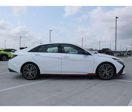 2023 Hyundai Elantra N Base is a White 2023 Hyundai Elantra Sedan in Friendswood TX