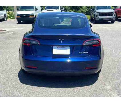 2023 Tesla Model 3 Long Range Dual Motor All-Wheel Drive is a Blue 2023 Tesla Model 3 Long Range Sedan in Savannah GA