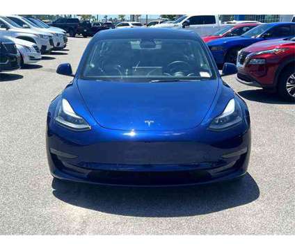 2023 Tesla Model 3 Long Range Dual Motor All-Wheel Drive is a Blue 2023 Tesla Model 3 Long Range Sedan in Savannah GA