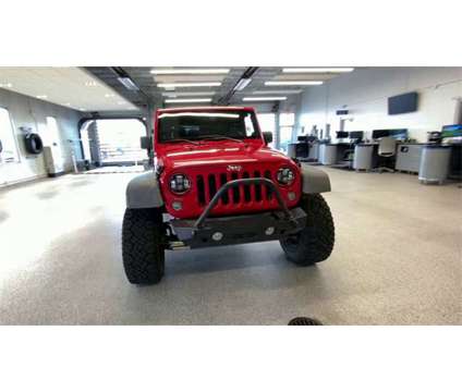 2014 Jeep Wrangler Unlimited Rubicon is a Red 2014 Jeep Wrangler Unlimited Rubicon SUV in Colorado Springs CO