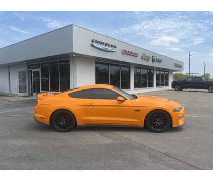 2018 Ford Mustang GT Premium is a Orange 2018 Ford Mustang GT Premium Coupe in Houghton Lake MI