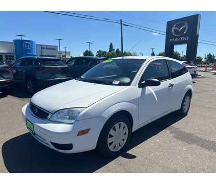 2006 Ford Focus ZX3 is a White 2006 Ford Focus ZX3 Car for Sale in Gladstone OR