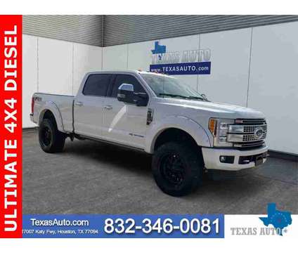 2017 Ford F-350SD Platinum is a Silver, White 2017 Ford F-350 Platinum Truck in Houston TX