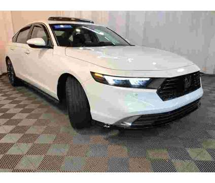2023 Honda Accord Hybrid Touring is a Silver, White 2023 Honda Accord Hybrid Touring Hybrid in North Olmsted OH