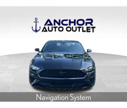 2018 Ford Mustang GT is a Black 2018 Ford Mustang GT Coupe in Cary NC