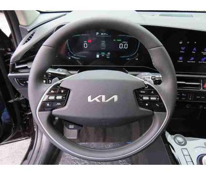 2024 Kia Niro Plug-In Hybrid EX is a Black 2024 Kia Niro EX Hybrid in Oconomowoc WI