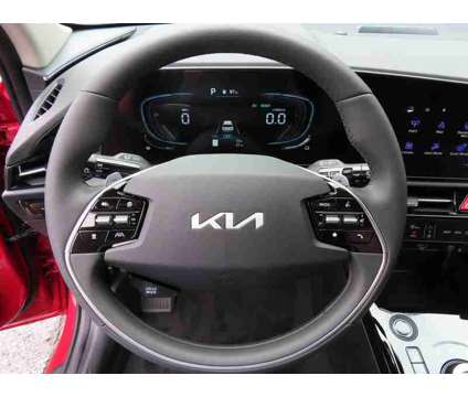 2024 Kia Niro Plug-In Hybrid EX is a Red 2024 Kia Niro EX Hybrid in Oconomowoc WI