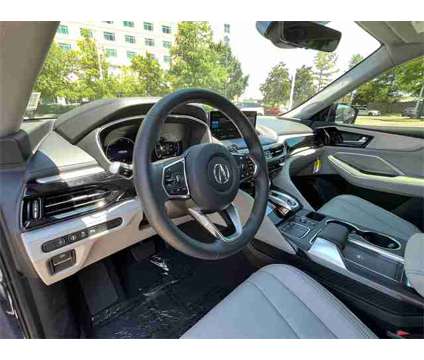2024 Acura MDX Technology SH-AWD is a Blue 2024 Acura MDX Technology SUV in Houston TX