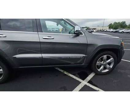 2013 Jeep Grand Cherokee for sale is a Grey 2013 Jeep grand cherokee Car for Sale in Charlotte NC