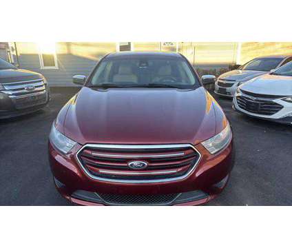 2014 Ford Taurus for sale is a Red 2014 Ford Taurus Car for Sale in Denver CO