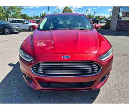 2013 Ford Fusion for sale is a Red 2013 Ford Fusion Car for Sale in Wayne MI