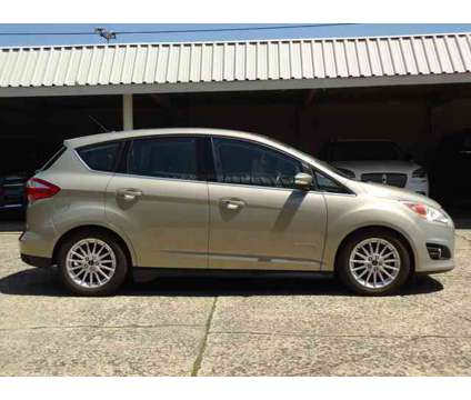 2015 Ford C-Max Hybrid SEL is a Gold 2015 Ford C-Max Hybrid SEL Hybrid in Chambersburg PA